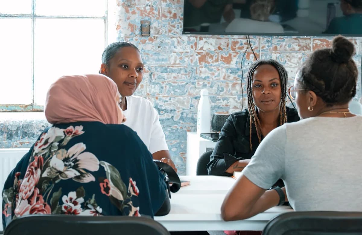 Female founders in conversation at a community event